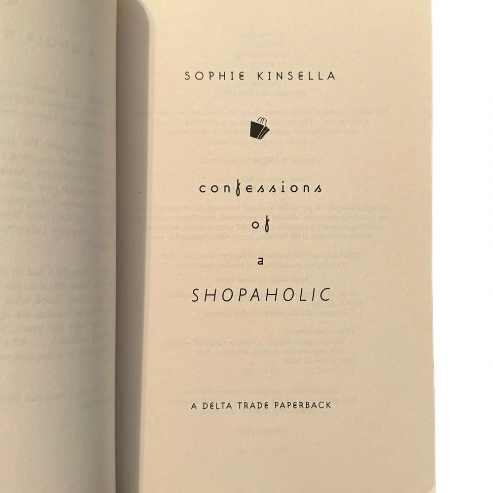 (Book) “Confessions Of A Shopaholic,” By Sophie Kinsella.